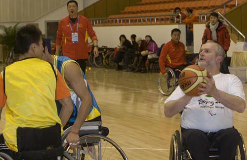 Sir Philip Craven enjoying a game of wheelchair basketball